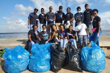 Members of the Junior Chamber International observed World Cleanup Day by joining the Caribbean Youth Environment Network (CYEN) and other youth groups in a coastal clean-up campaign at the Kingston Seawall on Saturday morning. (Photo by Terrence Thompson)