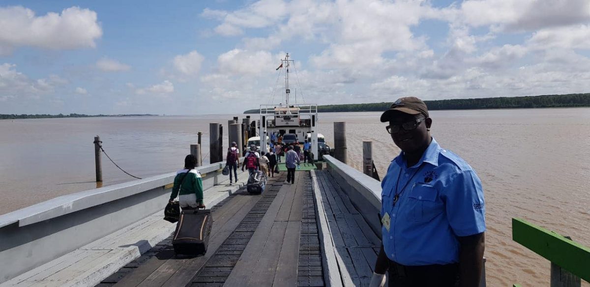 Travellers making their way aboard the M.B Sandaka, the replacement vessel for the Canawaima Ferry, as the ferry service between Guyana and Suriname resumed on Thursday. According to the Ministry of Public Infrastructure, 120 passengers and five vehicles boarded the vessel for its inaugural journey. (Ministry of Public Infrastructure photo) 
