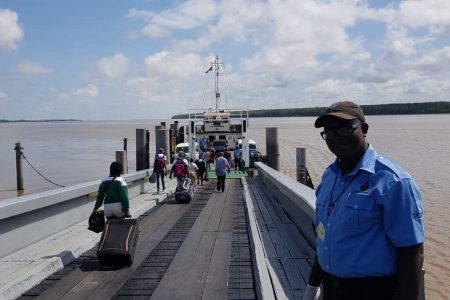 Travellers making their way aboard the M.B Sandaka, the replacement vessel for the Canawaima Ferry, as the ferry service between Guyana and Suriname resumed on Thursday. According to the Ministry of Public Infrastructure, 120 passengers and five vehicles boarded the vessel for its inaugural journey. (Ministry of Public Infrastructure photo)

