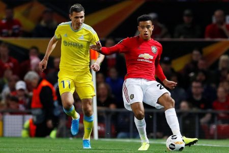 Manchester United’s Mason Greenwood in action with Astana’s Dmitri Shomko. (Action Images via Reuters/Jason Cairnduff)