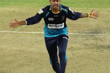  Leg-spinner Sandeep Lamichhane celebrates one of this three wickets in the Caribbean Premier League on Wednesday night. (CPL photo) 