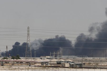 Smoke is seen following a fire at Aramco facility in the eastern city of Abqaiq, Saudi Arabia, yesterday. (REUTERS/Stringer)
