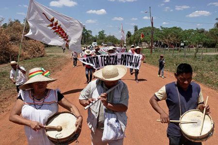 People march during the 10th Indigenous March to defend Mother Earth near San Jose, Bolivia, September 27, 2019. REUTERS/David Mercado