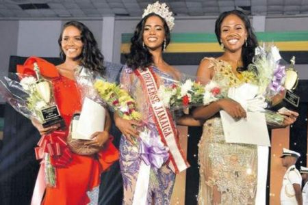 Iana Tickle Garcia, newly crowned Miss Universe Jamaica 2019, is flanked by third-place finisher Sian Graham Connolly (left) and Toni Ann Laylor, second-place finisher at the grand coronation held at the National Arena in Kingston last Saturday night. (Photo: Norman Thomas)