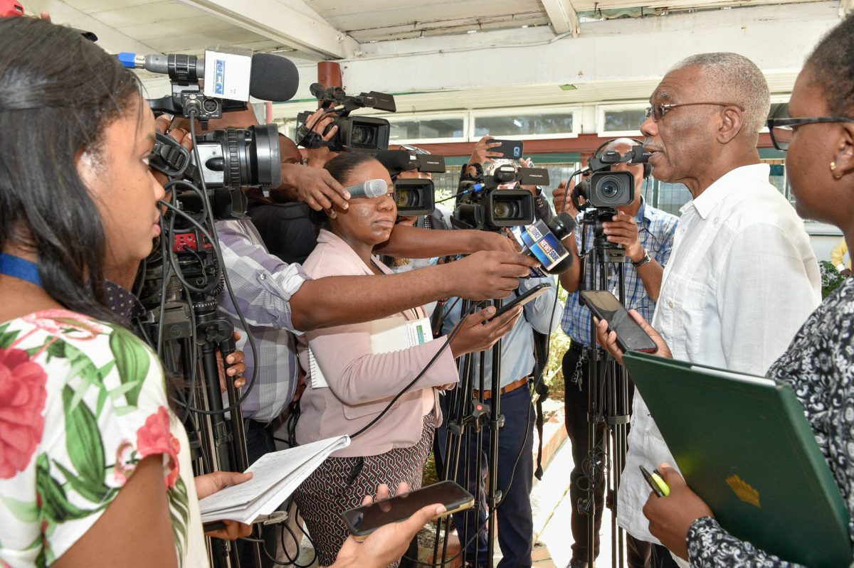 President David Granger speaking with the media yesterday at the Cyril Potter College of Education on the election date. (Ministry of the Presidency photo)
