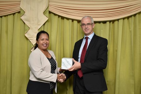 Minister of State, Dawn Hastings-Williams (left) with United Kingdom Deputy High Commissioner to Guyana, Ray Davidson. (Ministry of the Presidency photo)
