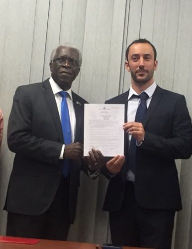 Director General of the GCAA Lieutenant Colonel (ret’d) Egbert Fields (left) handed over the first Helideck licence to Country Manager of TLC Guyana Inc, Mathieu Guiraud yesterday morning.