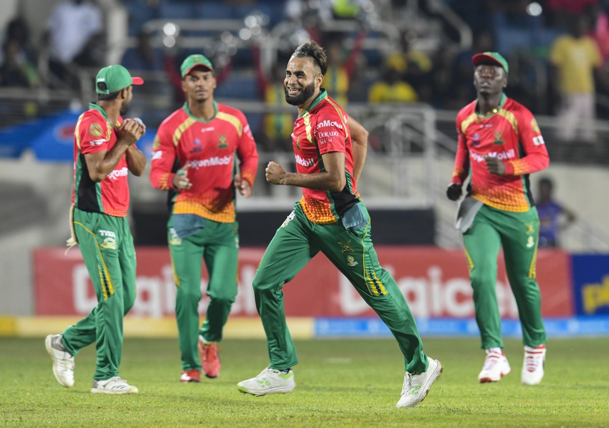 KINGSTON, JAMAICA - SEPTEMBER 18: In this handout image provided by CPL T20, Imran Tahir (2R) of Guyana Amazon Warriors celebrates the dismissal of Chadwick Walton of Jamaica Tallawahs during match 15 of the Hero Caribbean Premier League between Jamaica Tallawahs and Guyana Amazon Warriors at Sabina Park on September 18, 2019 in Kingston, Jamaica. (Photo by Randy Brooks - CPL T20/Getty Images)