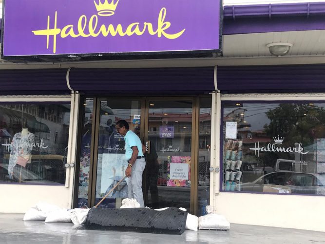 The Hallmark Store on Quamina Street had to place sandbags at the entrance in a bid to prevent floodwater from entering.