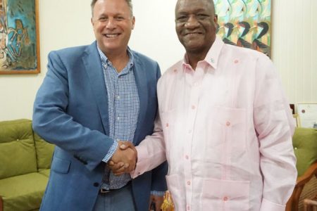 IT’S A DEAL! The Caribbean Premier League’s COO Pete Russell and Joe Harmon.
