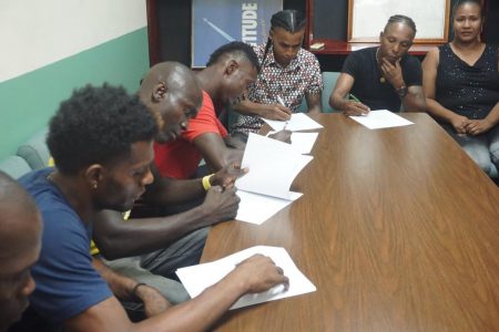  Boxers for the ‘Not In My House’ card slated for September 28 at D’Urban Park signing their respective contracts yesterday.
