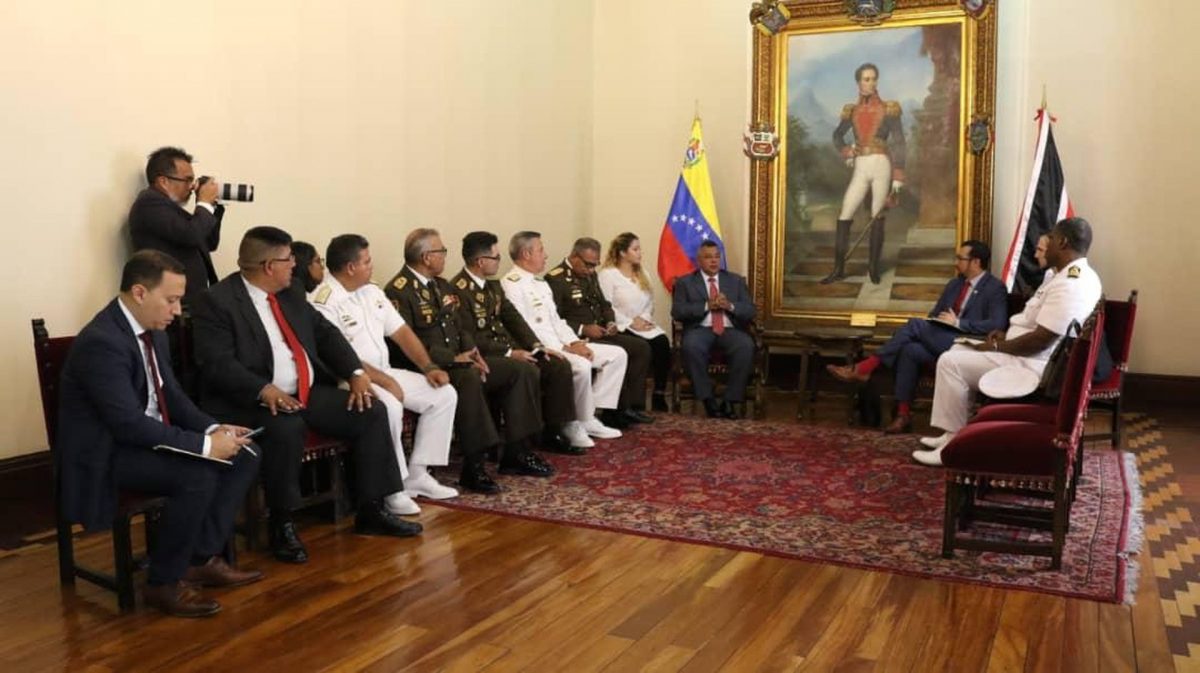 National Security Minister and Minister in the Office of the Prime Minister Stuart Young (right) meets with Venezuelan ministers and officials in Caracas, yesterday. Office of the Prime Minister photo