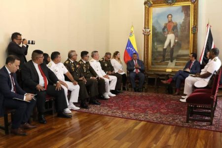National Security Minister and Minister in the Office of the Prime Minister Stuart Young (right) meets with Venezuelan ministers and officials in Caracas, yesterday. Office of the Prime Minister photo