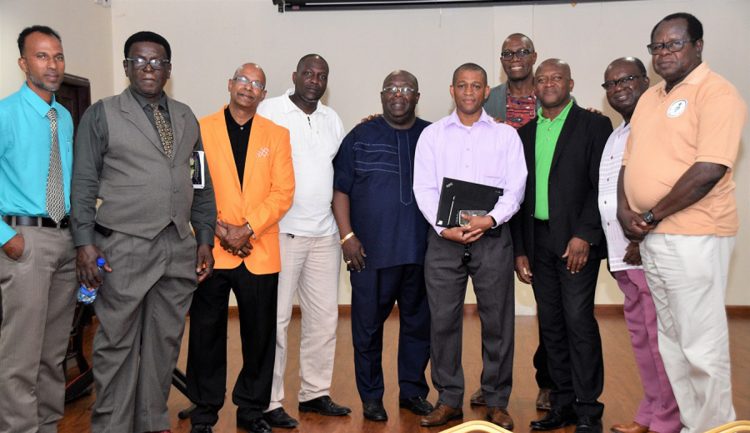 Director, Department of Energy, Dr. Mark Bynoe (fifth from right) along with some of the organizers and participants at the Men’s Regional Convention at the Ramada Hotel, East Bank Demerara. (Ministry of the Presidency photo)