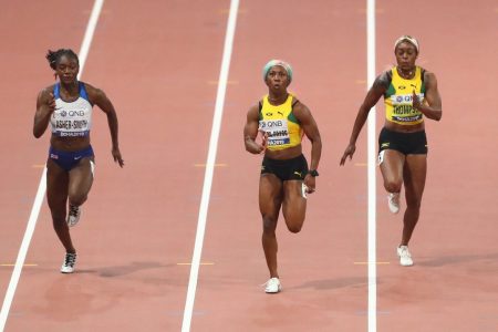 Jamaica’s Shelly Ann Fraser-Pryce centre storming her way to yet another 100m World Championships gold medal.