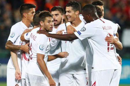 Cristiano Ronaldo celebrates scoring his team’s second goal with team mates (Reuters photo)
