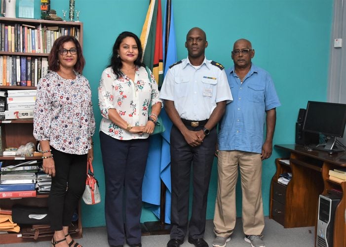 Director-General of the CDC, Lieutenant Colonel Kester Craig (second right) along with, (from left) Treasurer of the Guyana Hindu Dharmic Sabha, Savitri Sukhai; President of the Guyana Hindu Dharmic Sabha, Dr. Vindhya Persaud and Executive Committee Member of the GHDS, Michael Seram, after the presentation to the CDC. (Ministry of the Presidency photo)