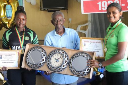 Former BCB President Malcolm Peters with the latest West Indies female players, Sheneta Grimmond (left) and Shabika Gajnabi. (Romario Samaroo photo)