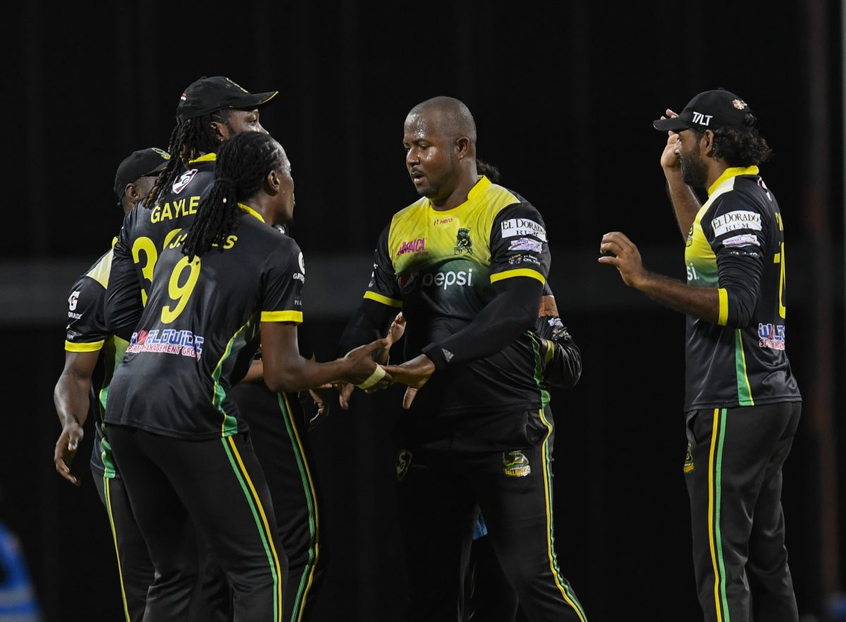 Some of the Tallawahs players including Dwayne Smith,  Steven Jacobs, and Chris Gayle celebrate their unlikely win. Photo courtesy CPL)