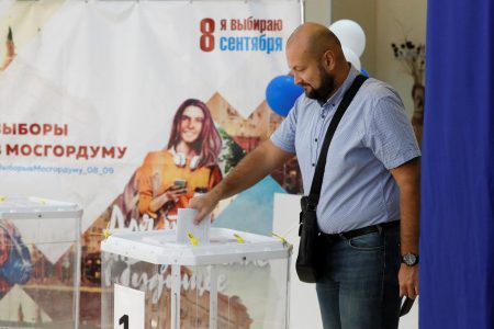 A voter casts his ballot (Reuters photo)