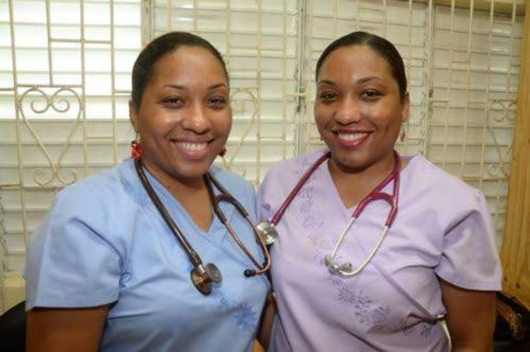Twins doctors at the Clarendon Health Department, Krystle (left) and Kimberley Maragh. (Photos: Joseph wellington) 