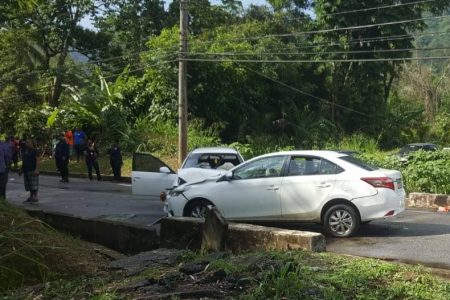 Two cars remain on a road in Lleungo Village, Maracas, St Joseph after gunmen ambushed Dillon Mieres and his wife Mary Reyes on September 7, 2019. Mieres died and Reyes was hospitalised.

