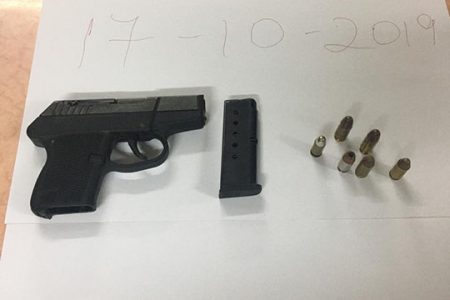 The pistol and rounds that were found on Thursday (Guyana Police Force photo) 