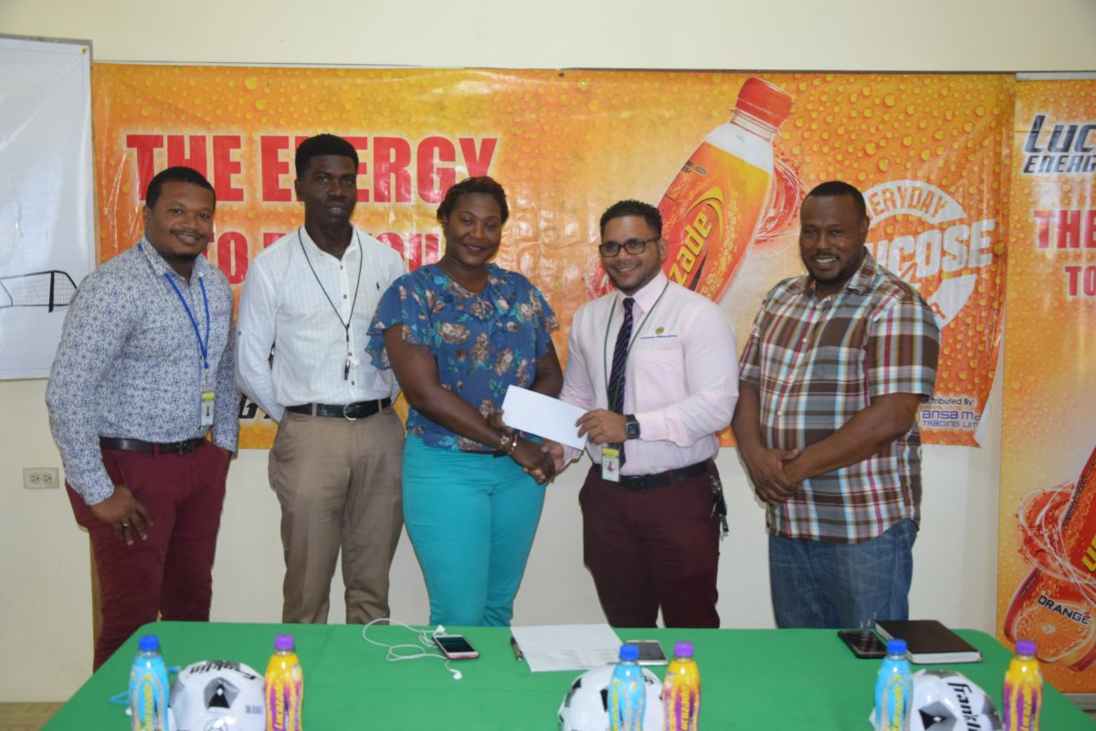 Jacklyn Boodie (center) of the Petra Organization collecting the sponsorship cheque from Fharis Mohamed of ANSA McAL. Also in the photo are ANSA McAL PRO Treiston Joseph (left), Mark Alleyne (2nd left) and Troy Mendonca (right).
