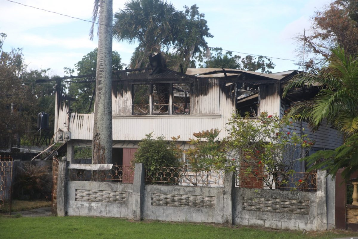 The fire-damaged house

