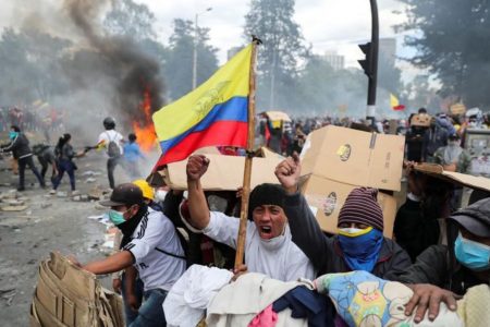 Demonstrators gesture during a protest against Ecuador’s President Lenin Moreno’s austerity measures in Quito, Ecuador yesterday. (REUTERS/Ivan Alvarado)