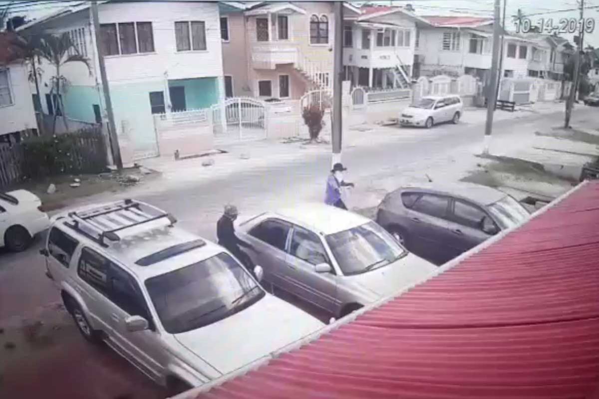 A snapshot taken from surveillance footage of the attack. The gunmen are seen approaching the car which Deon Stoll was in.
