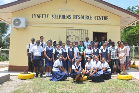 Minister of State Dawn Hastings-Williams (centre) along with Coordinator, Department of Social Cohesion Natasha Singh-Lewis, Mahdia Mayor David Adams, Regional Chairman Bonaventure Fredericks, Regional Executive Officer Mitzy Campbell, Lynette Stephen, donors and students of the Mahdia Secondary School at the opening ceremony of the Lynette Stephen Resource Centre. (Ministry of the Presidency photo)
