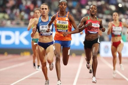 Sifan Hassan of the Netherlands in action with Kenya’s Faith Kipyegon and Shelby Houlihan of the US in Doha yesterday. (REUTERS/Lucy Nicholson)