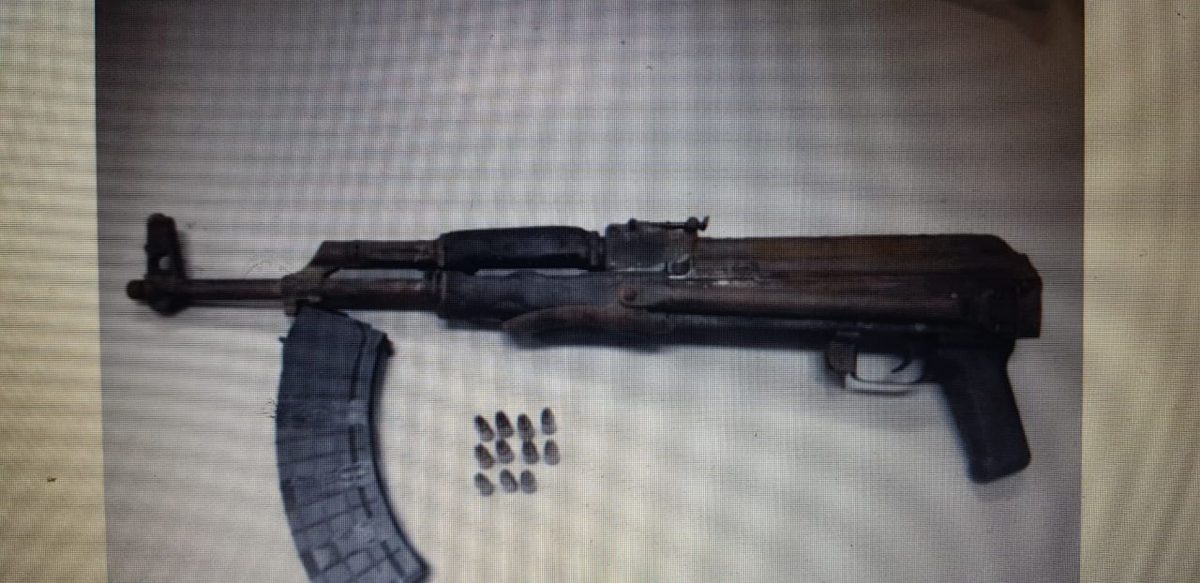 The AK-47 and ammunition recovered from the car of a Santa Cruz suspect on Sunday.