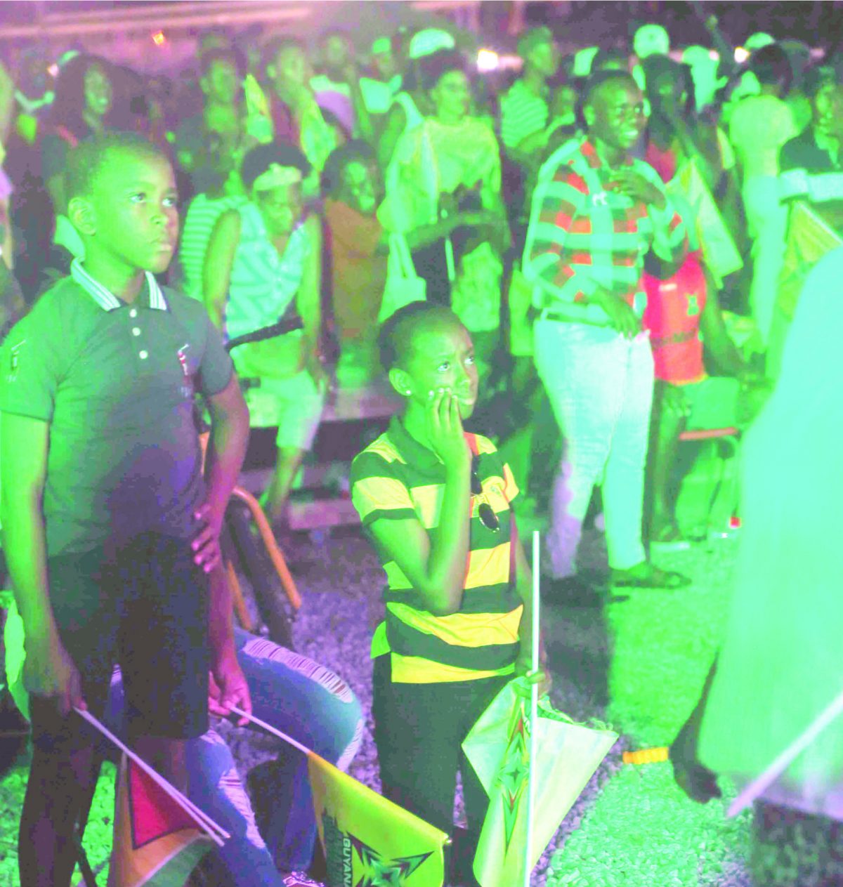Their faces tell the story: Young Guyana Amazon Warriors (GAW) supporters react to the team’s loss in the finals of the Caribbean Premier League (CPL) at the government-sponsored Watch Party, held at the D’Urban Park last night. (Photo by Terrence Thompson) 