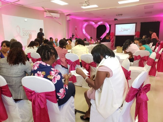 Participants immersed in discussions about cancer-related topics.
