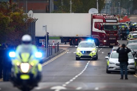 Police move the lorry container where bodies were discovered, in Grays, Essex, Britain October 23, 2019. REUTERS/Hannah McKay