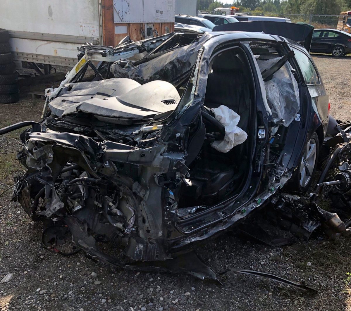 This Tuesday, Oct. 1, 2019 photo, released by the Ontario Provincial Police, shows the a smashed up vehicle involved in a fatal crash with transport truck near Shelburne, Ontario. Canadian police say the Jamaican dancehall reggae artist and actor known as Louie Rankin died Monday, Sept. 30, 2019, in the car crash involving a transport truck.