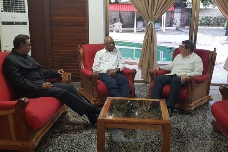 President David Granger (at centre) with Cuban Foreign Minister Bruno Rodriguez Parrilla (right) and Guyana’s Ambassador to Cuba Halim Majeed in March this year in Cuba. (Embassy of Guyana photo)