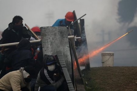 Demonstrators fire a homemade weapon during a protest against Ecuador’s President Lenin Moreno’s austerity measures, in Quito, Ecuador October 13, 2019. REUTERS/Ivan Alvarado