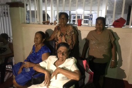 Some of the victims of the fire. Kalawati Boodram is in front at left, with her sister Liloutie Persaud (right). Her daughters Omadai and her sister Deocali are standing.
