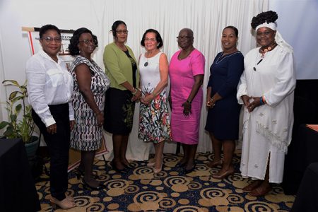 First Lady,  Sandra Granger (centre) is pictured with newly appointed Permanent Secretary of the Ministry of Public Service, Karen Vansluytman-Corbin (third from left) and other members of the Women and Gender Equality Commission. (Ministry of the Presidency photo)