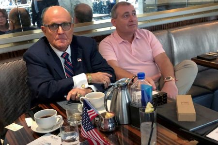 U.S. President Donald Trump's personal lawyer Rudy Giuliani has coffee with Ukrainian-American businessman Lev Parnas at the Trump International Hotel in Washington, U.S. September 20, 2019. REUTERS/Aram Roston/File Photo