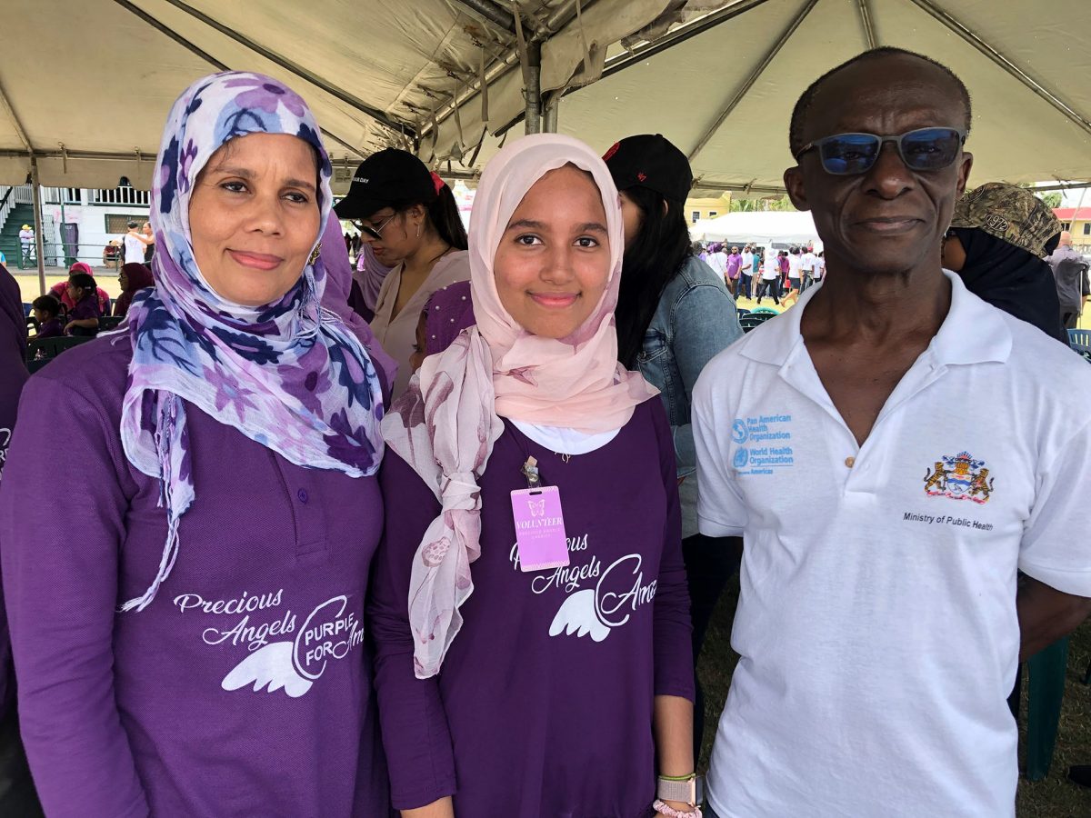 Hadiyyah Mohamed (centre) with her mother, Bonita Mohamed and Dr. William Adu-Krow