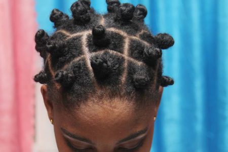This St Stephen's College student's Bantu knots led her to be warned by school officials about her hairstyle. Her mother's complaint against the school is being investigated by the Education Ministry.