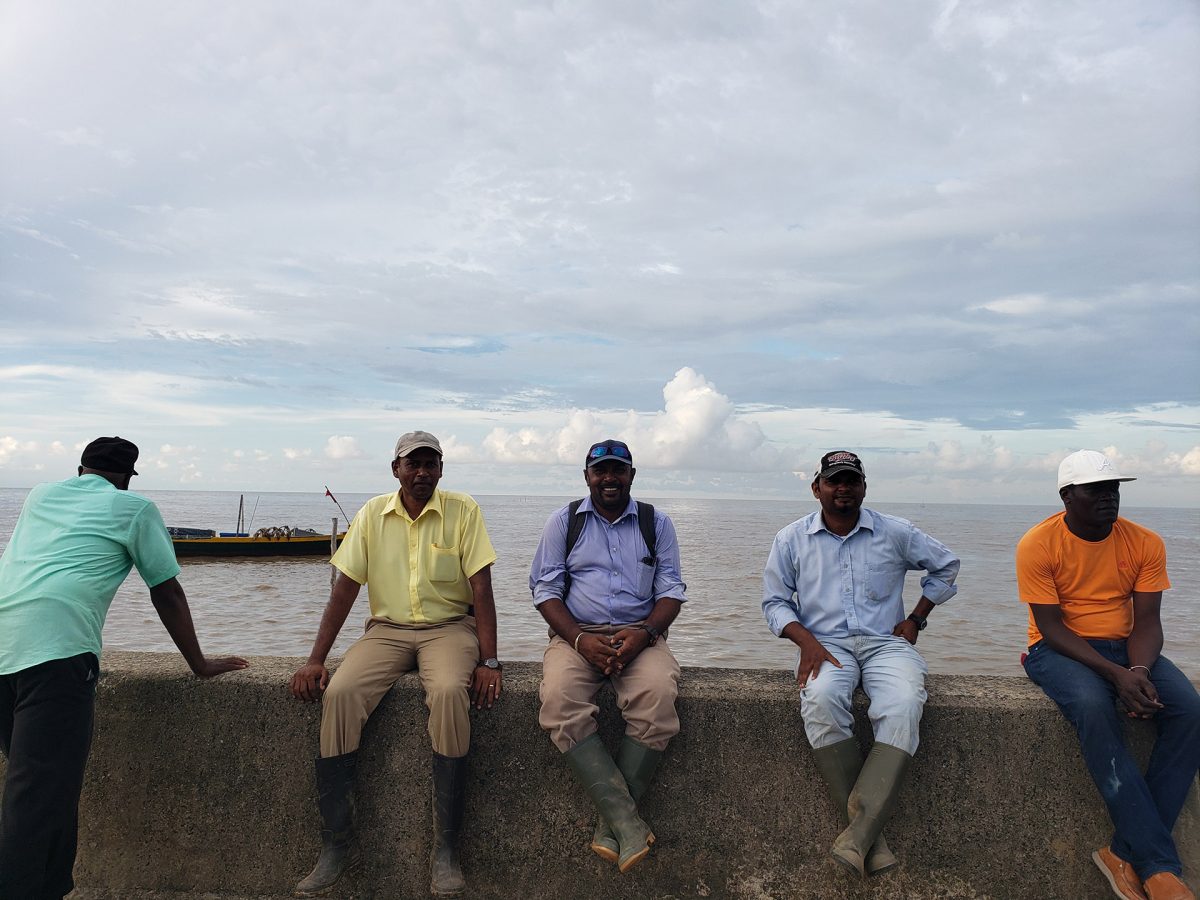 Ravindra Ramnarine (second from right) along with other members of the supervising team after the repairs on the temporary concluded. 