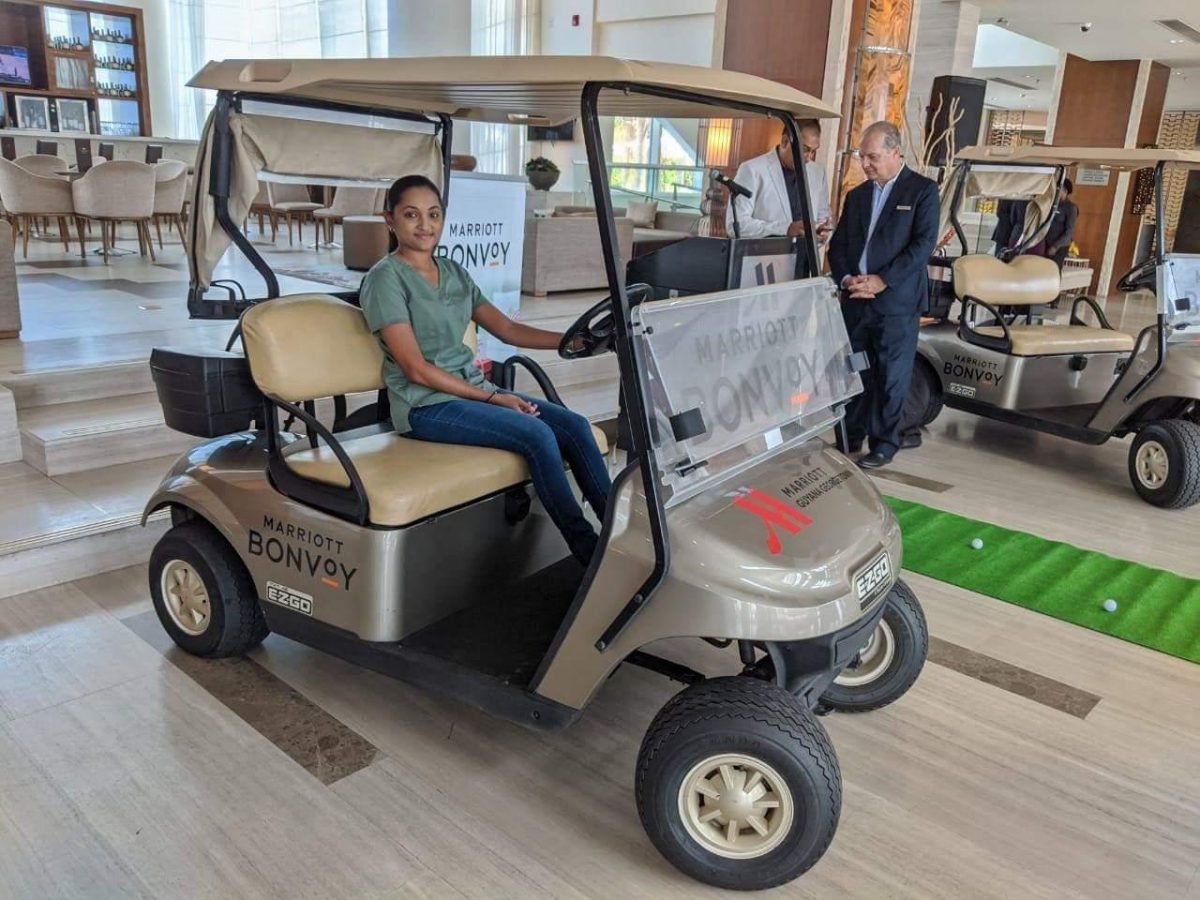 Assistant Club Captain, Dr Joaan Deo tries out one of the newly branded Marriott golf carts.