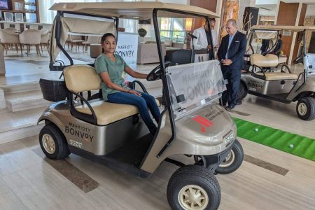 Assistant Club Captain, Dr Joaan Deo tries out one of the newly branded Marriott golf carts.