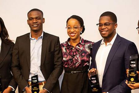 Coach Hanielle Hines (centre) with her victorious team of Jamaican law students (from left) Andria D Whyte, Rojae Brown, Jonathan Dwyer and Kimberley Brown after they won the inaugural Qatar International Cybersecurity Contest on October 3 in Doha, Qatar.