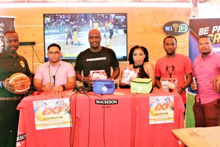 Members of the launch party pose for a photo opportunity following the official launch of the Mackeson/Rawle Toney 3x3 Basketball Classic at the Fireside Grill on Garnett Streets.